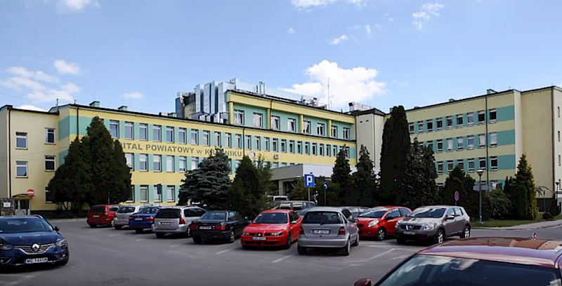 Obraz przedstawia szpital powiatowy w Kraśniku